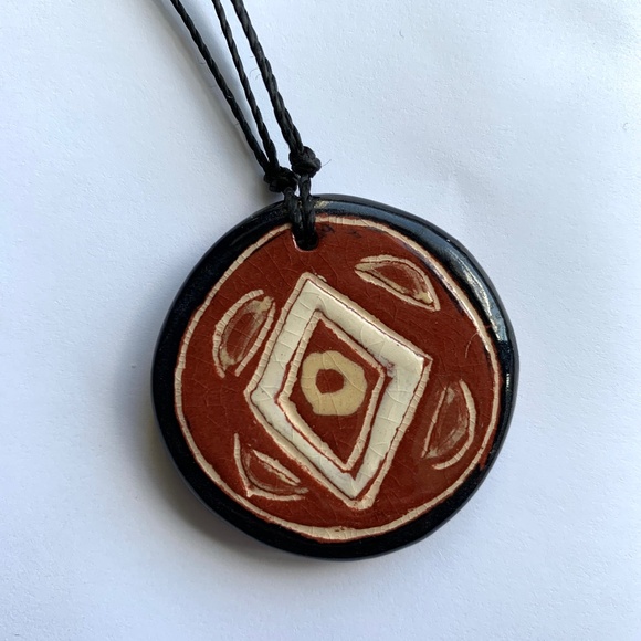 Jewelry - Ceramic pendant necklace in reddish-brown, cream, and black